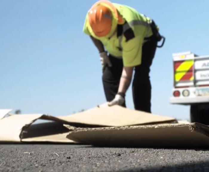 IRU picking up debris.