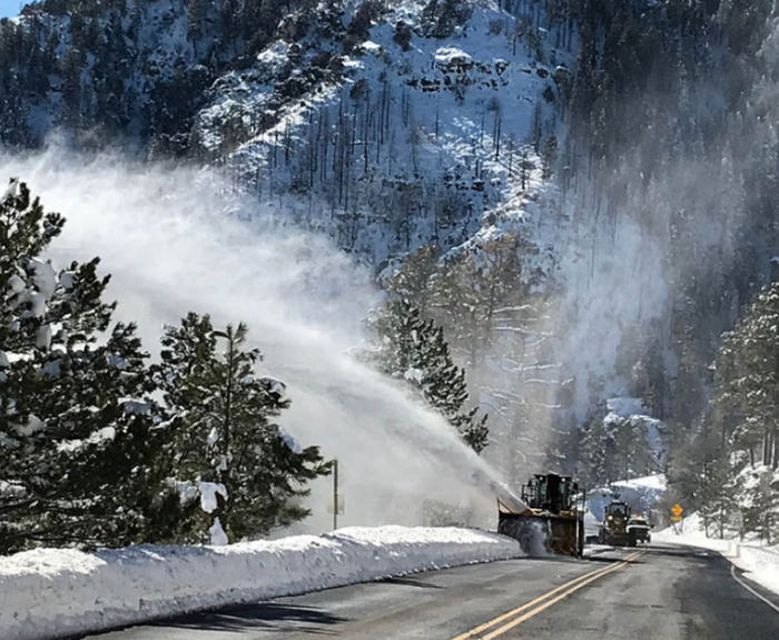ADOT snow blower clears highway