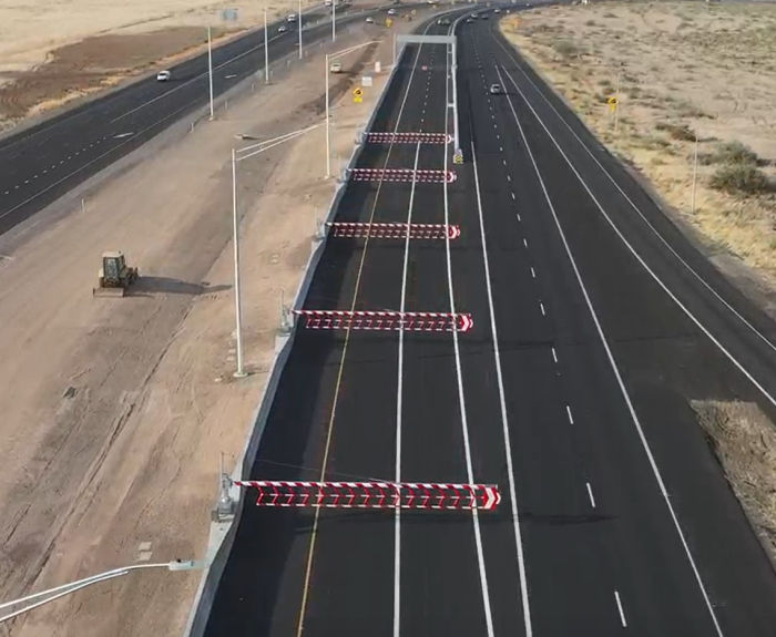 Swing gates that keep vehicles from going the wrong direction in I-17 flex lanes