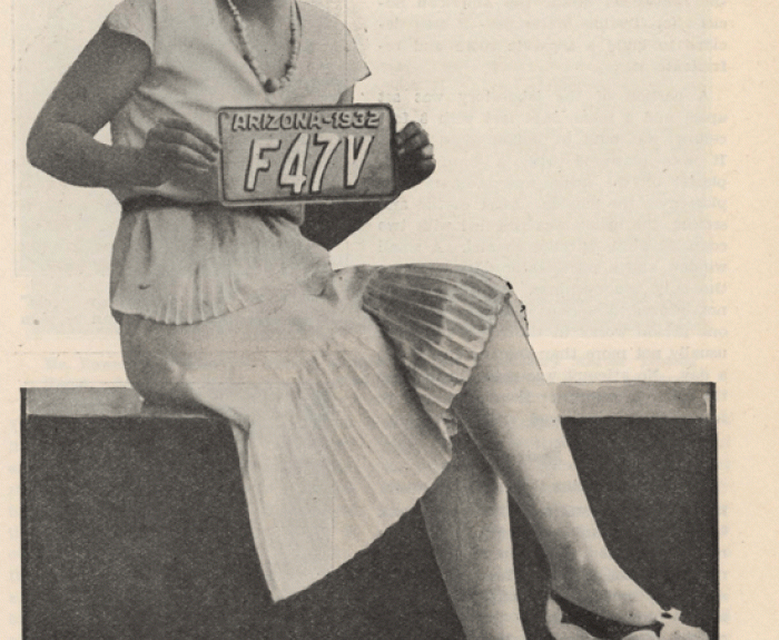Model displays 1931 license plate in Arizona Highways magazine