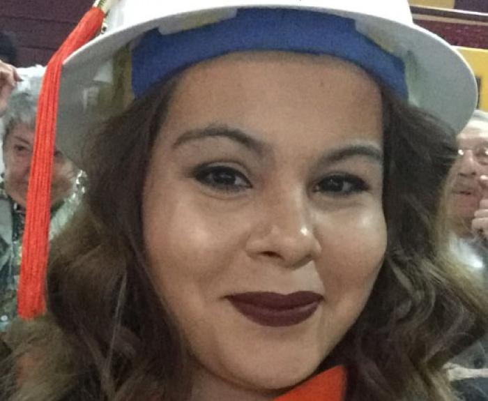 ADOT employee jocelyn wearing an asu graduation cap