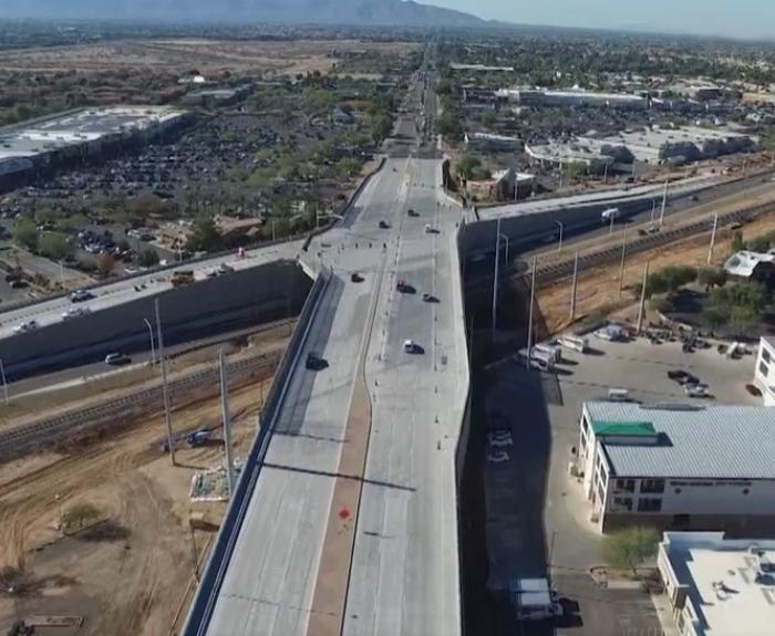 Bell Road bridge over Grand Avenue and railroad tracks viewed from a drone