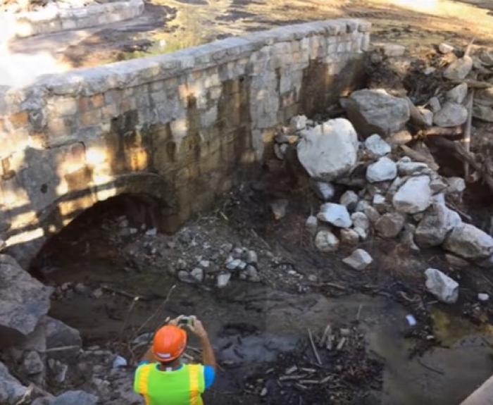 ADOT employee photographs damage to SR 366 bridge
