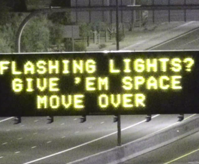 Freeway message board promoting Move Over law