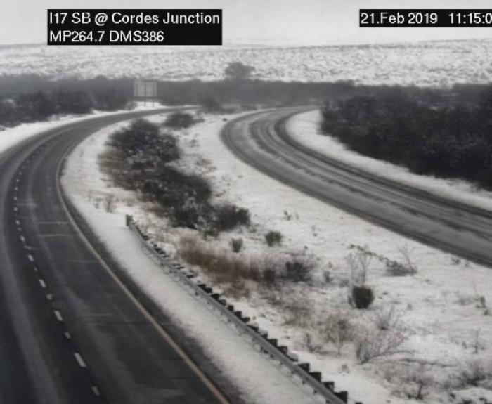 Traffic camera view of snow along I-17 at Cordes Junction