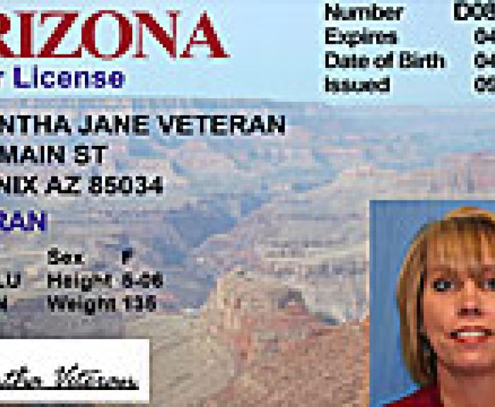 Arizona drivers license with photo of a woman, Grand Canyon background, and personal details visible.