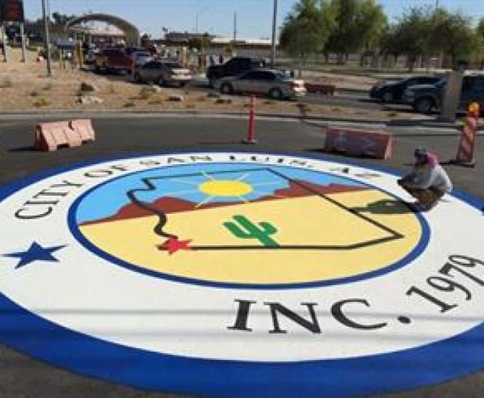 San Luis seal painted on pavement