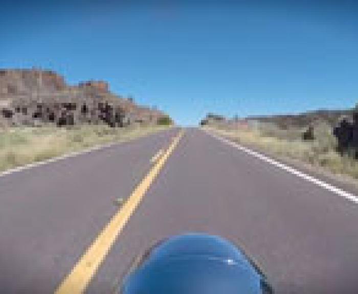 POV shot of motorcyclist on road