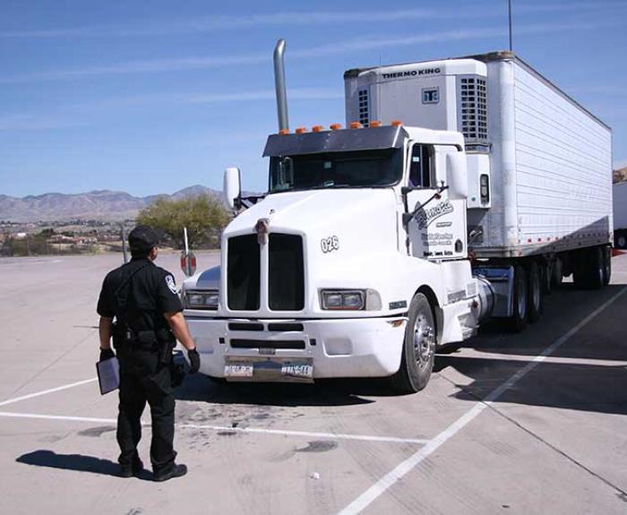 ADOT officer inspects semitrailer