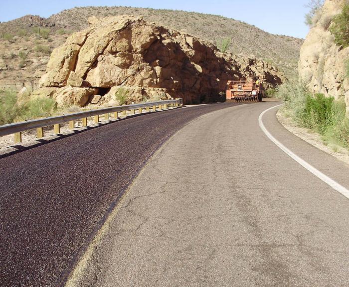 Image of road being chip sealed