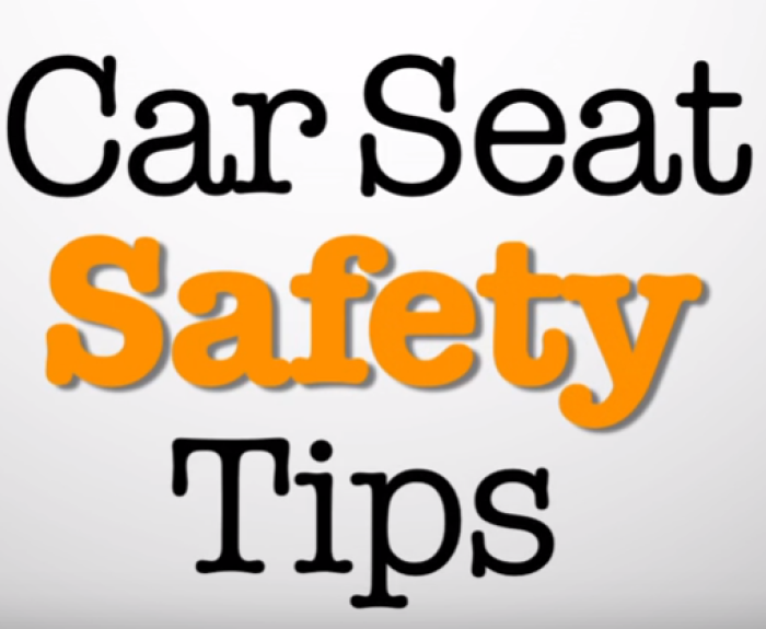 Text reading Car Seat Safety Tips with the word Safety highlighted in orange; other words are in black on a plain light background.