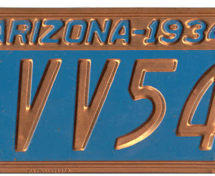 Blue and copper 1934 Arizona license plate reading VV54.