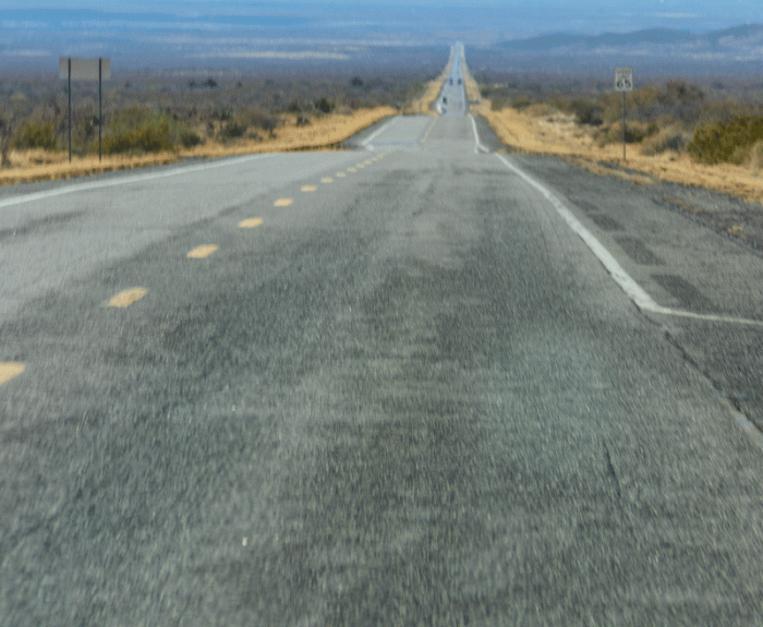 Freeway in Arizona showing snowy mountain in background