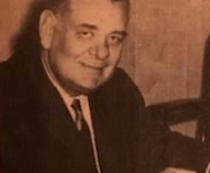 Justin Herman at a desk