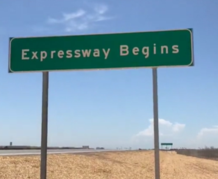Sign saying Expressway Begins