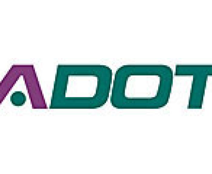 A logo features the word ADOT with a stylized purple A and green DOT in bold, uppercase letters on a white background.