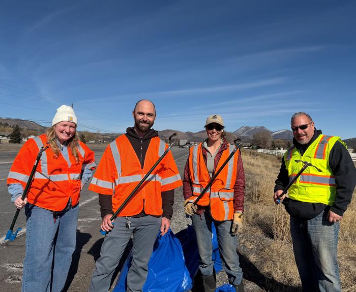 Four volunteers cleaning US 89