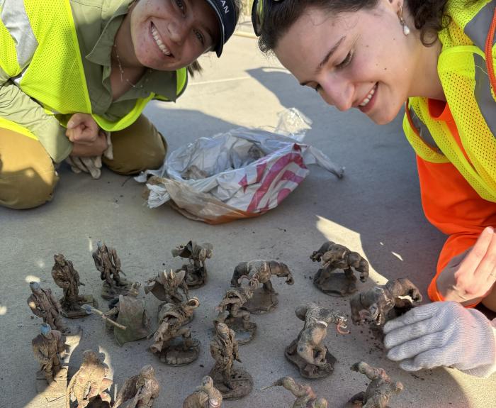 Adopt a Highway volunteers with found action figures
