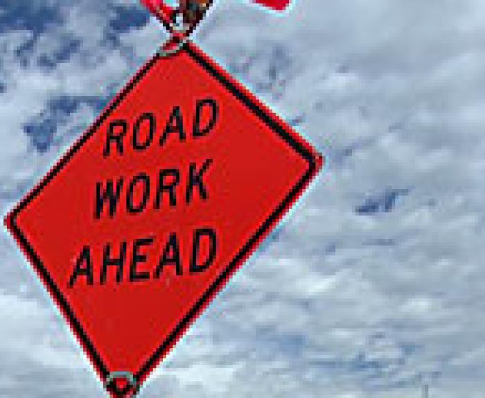 Road Work Ahead street sign