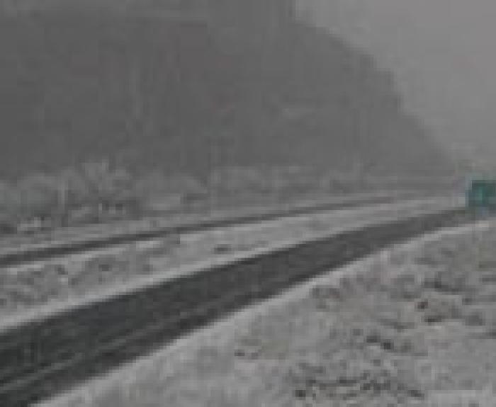Spring snow on freeway