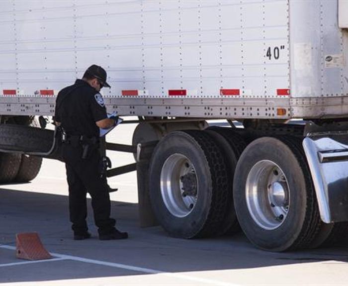 ECD performing truck inspection