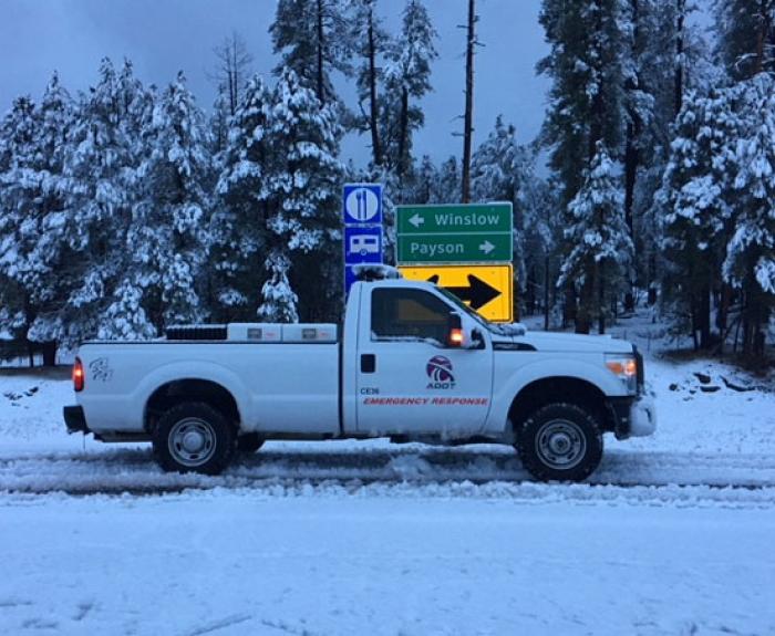 Emergency response pick up truck on a snowy road