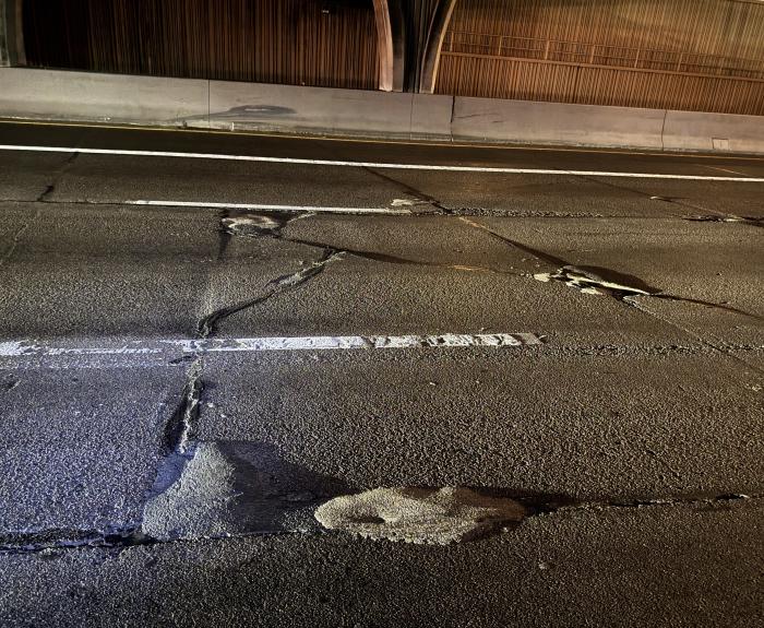 Photo of damaged pavement on SR 51 northbound at Camelback Road
