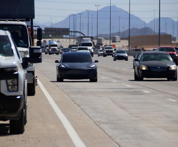 Vehicles driving on the highway. 