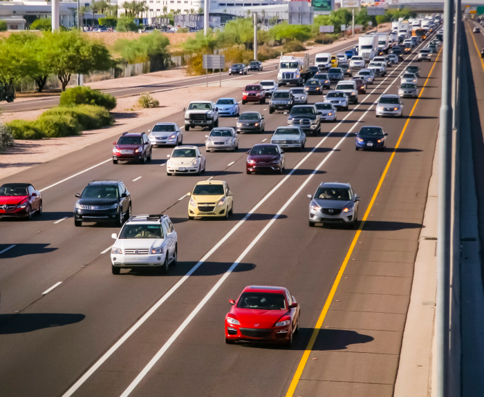 Cars driving on a highway. 