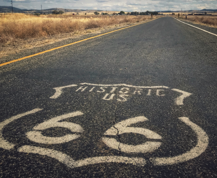 Image of Route 66 shield painted on roadway