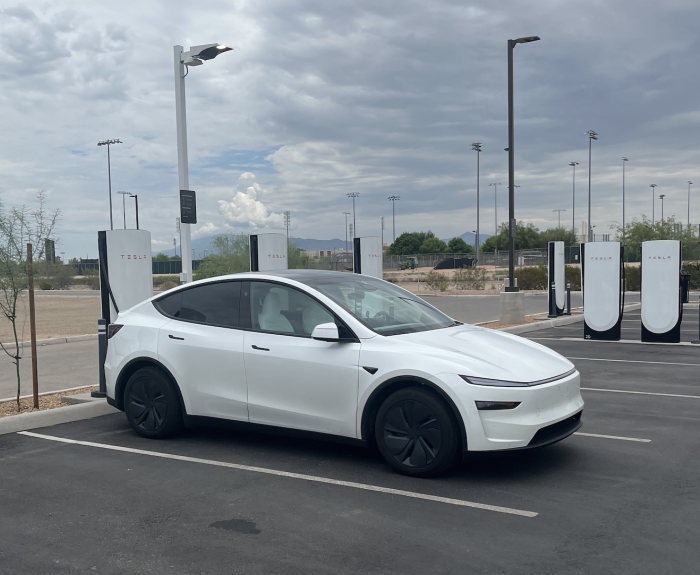 Photo of vehicle at electric vehicle charging station